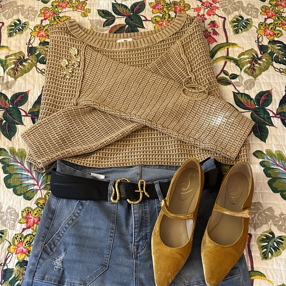 Camel colored Knit Sweater with exposed seams and intentional washed fabric